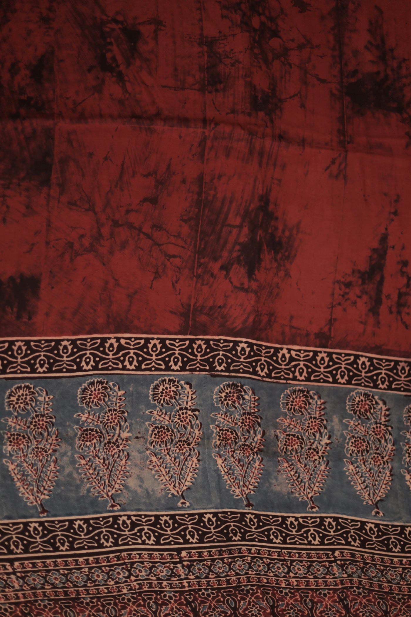 Traditional rustic maroon Ajrakh modal silk dupatta showcasing authentic artisan craftsmanship