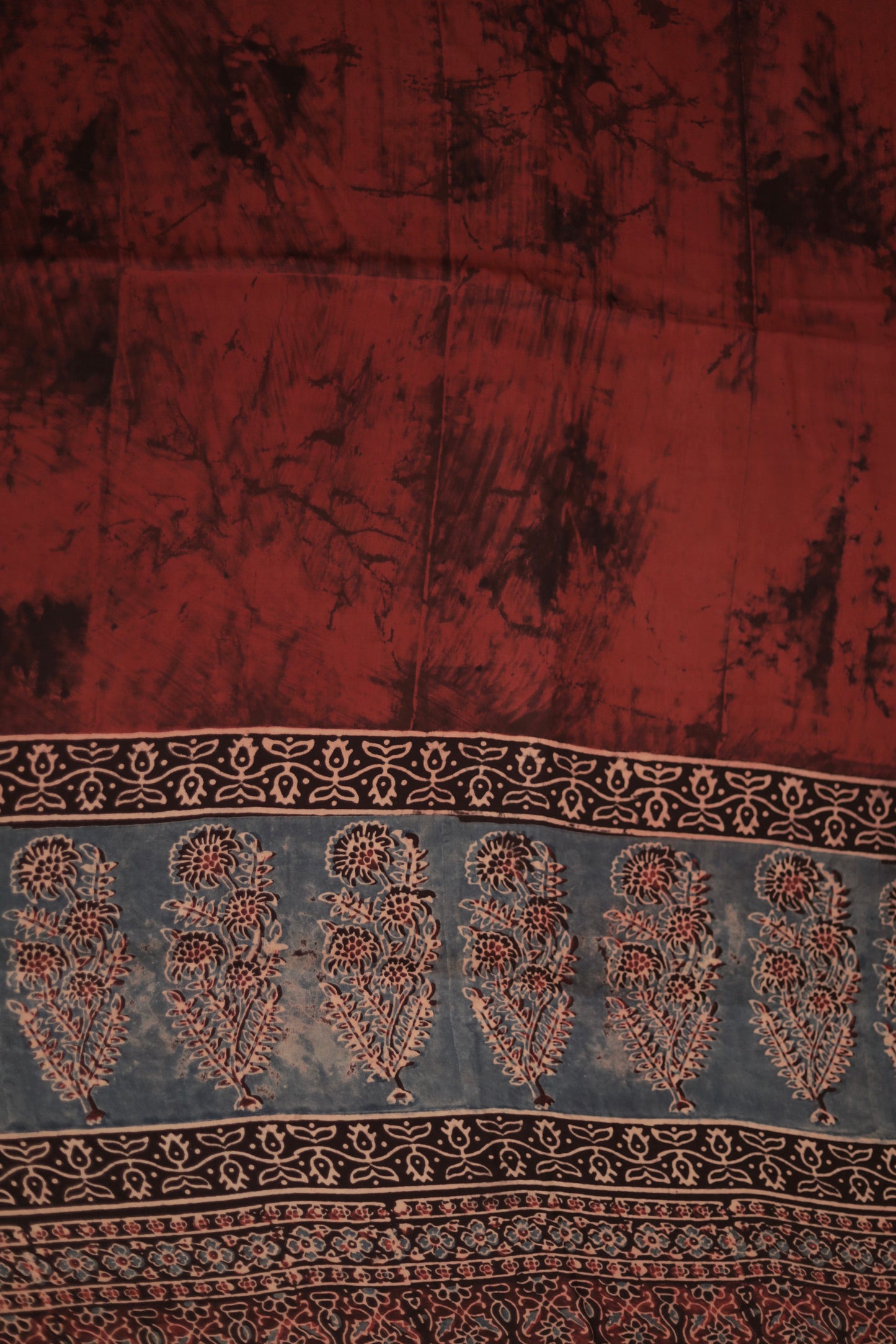 Traditional rustic maroon Ajrakh modal silk dupatta showcasing authentic artisan craftsmanship