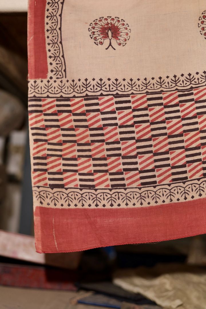 Traditional sand beige Ajrakh mul cotton dupatta showcasing authentic artisan craftsmanship