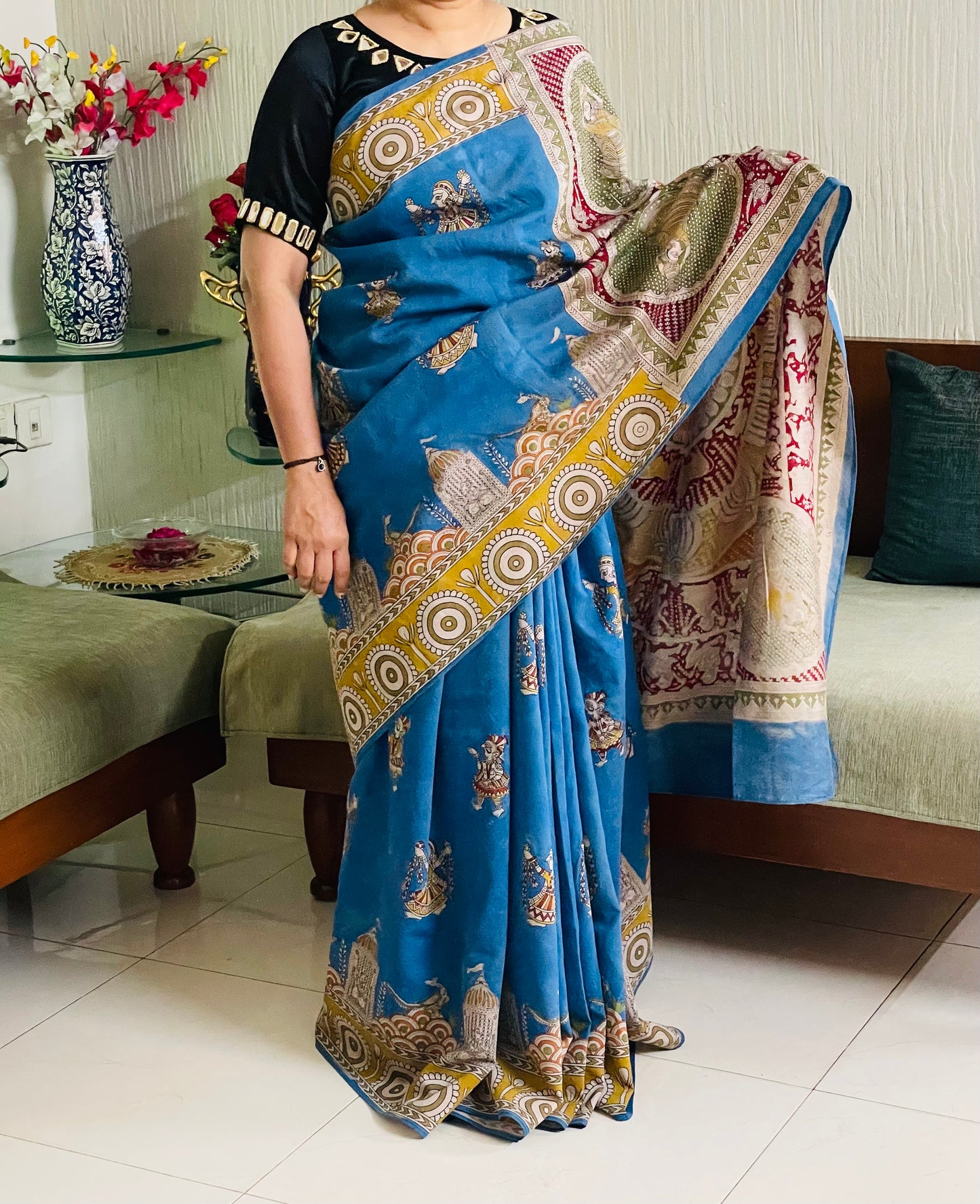 Handcrafted sky gold Mata Ni Pachedi saree adorned with authentic handpainted designs inspired by Gujarat's folk art heritage
