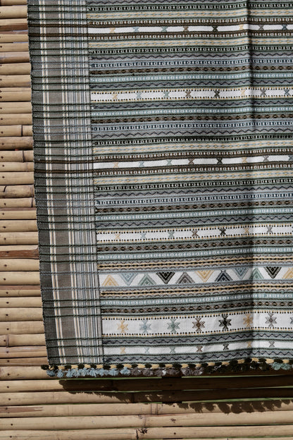 Premium handwoven woolen shawl in smoky white with a graceful drape and luxurious feel