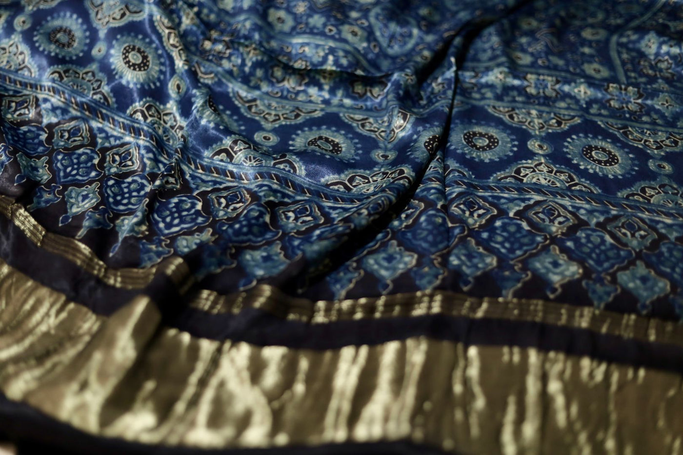 Traditional steel blue Ajrakh modal silk dupatta showcasing authentic artisan craftsmanship and decorative borders