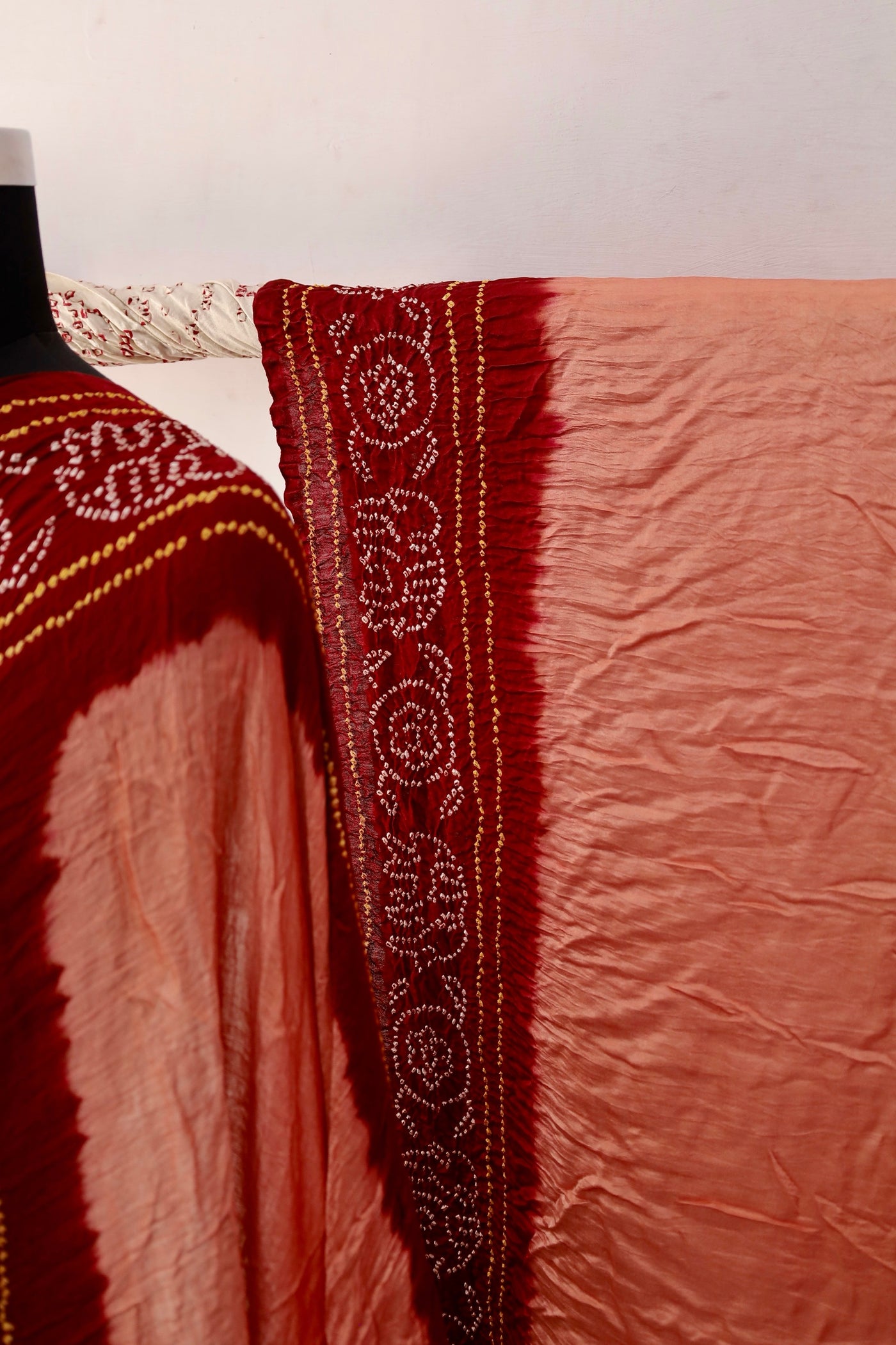 Traditional Bandhani Gajji silk saree in terracotta hues with a beautifully woven zari pallu