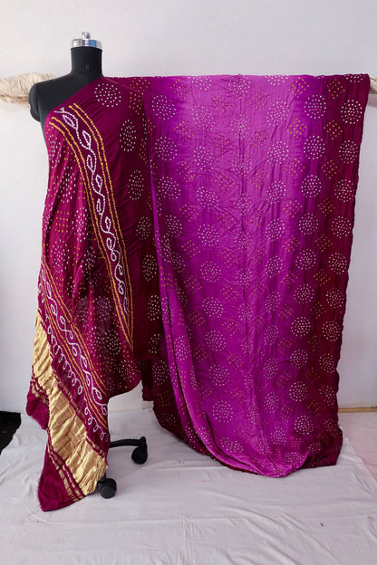 Wine Bandhani Gajji silk saree featuring intricate tie-dye patterns and an elegant zari pallu