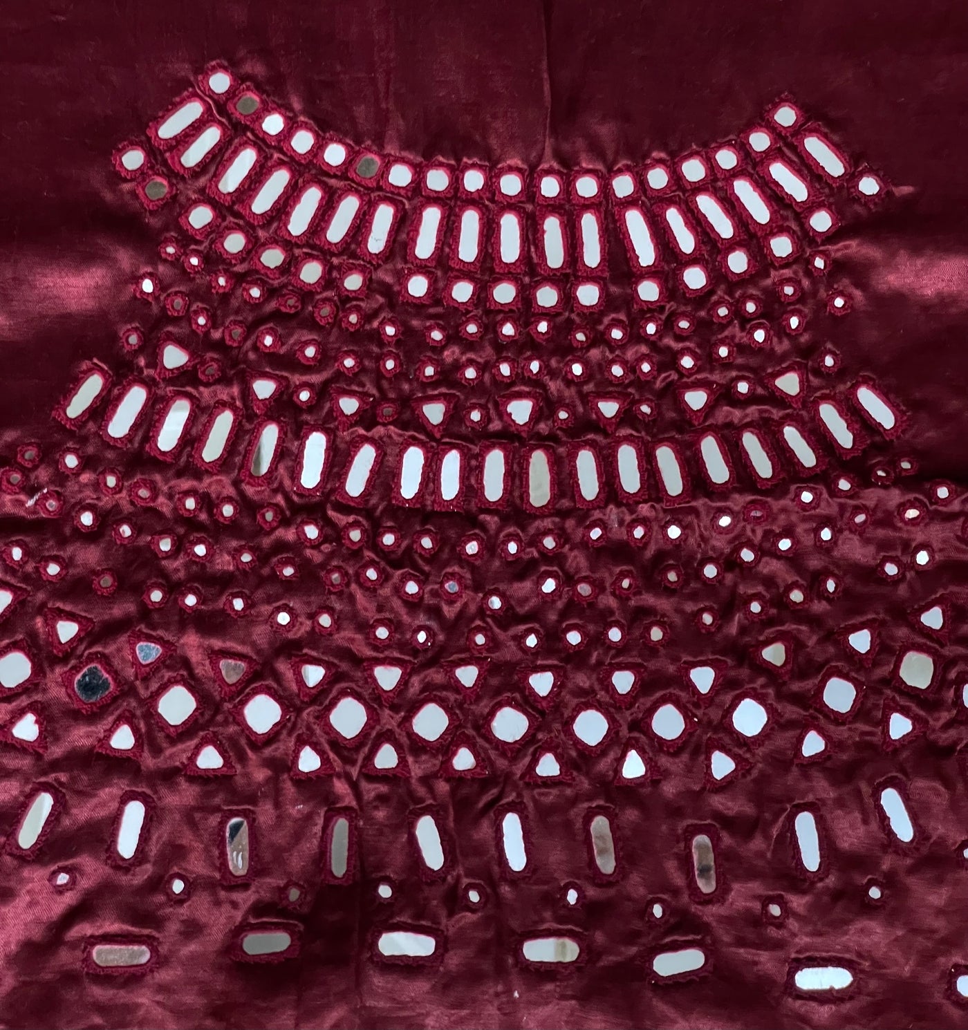 Wine burgundy mirror work blouse piece showcasing intricate handcrafted embellishments
