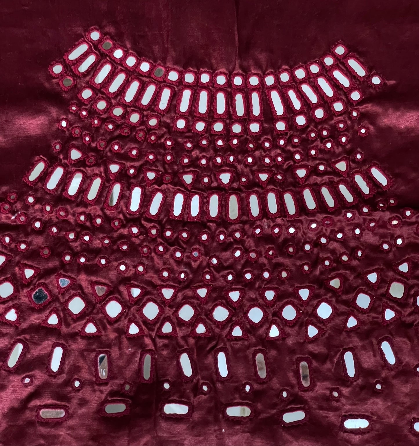 Wine burgundy mirror work blouse piece showcasing intricate handcrafted embellishments