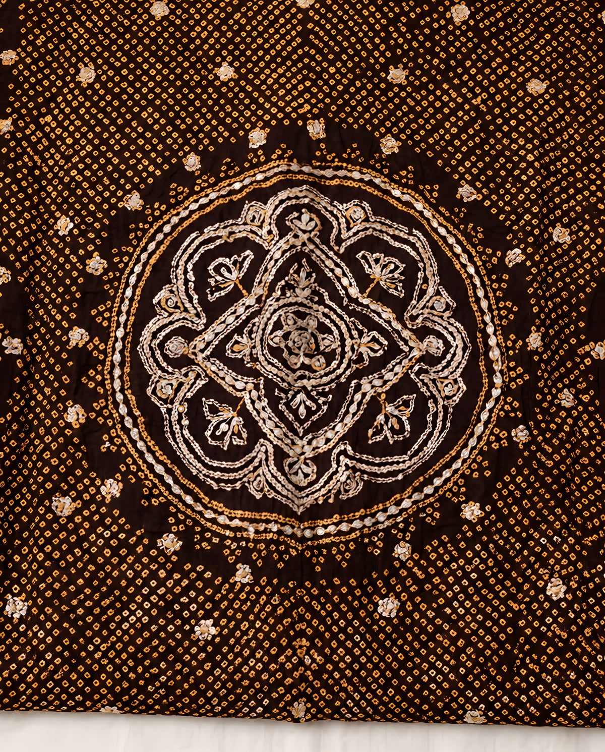 Traditional Bandhani tie-dye patterns on a black silk dupatta