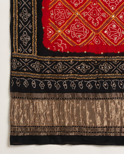 Border detailing on black and red Bandhani gota patti dupatta