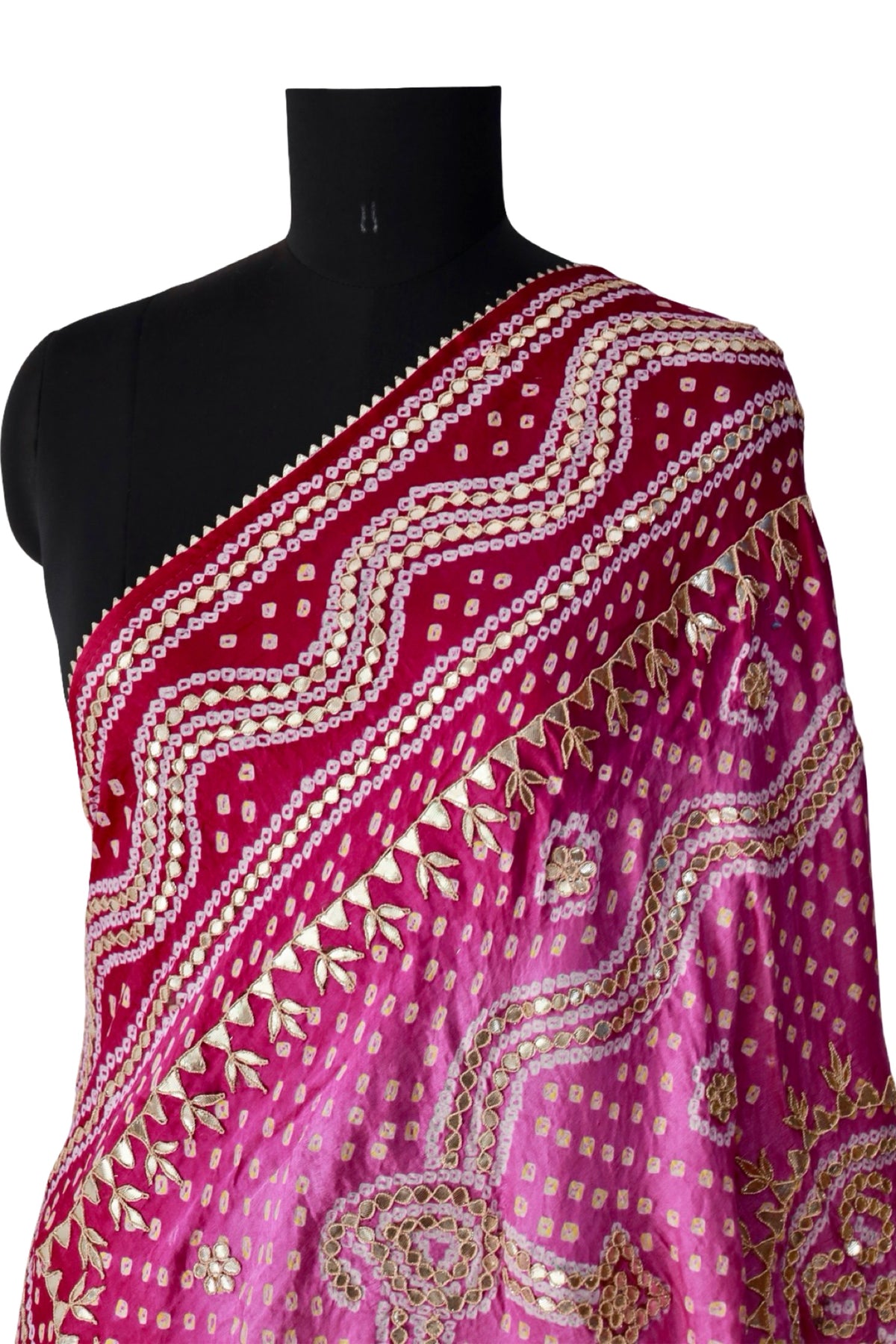 Burgundy border with flowing embellished lines on a pink silk Bandhani dupatta