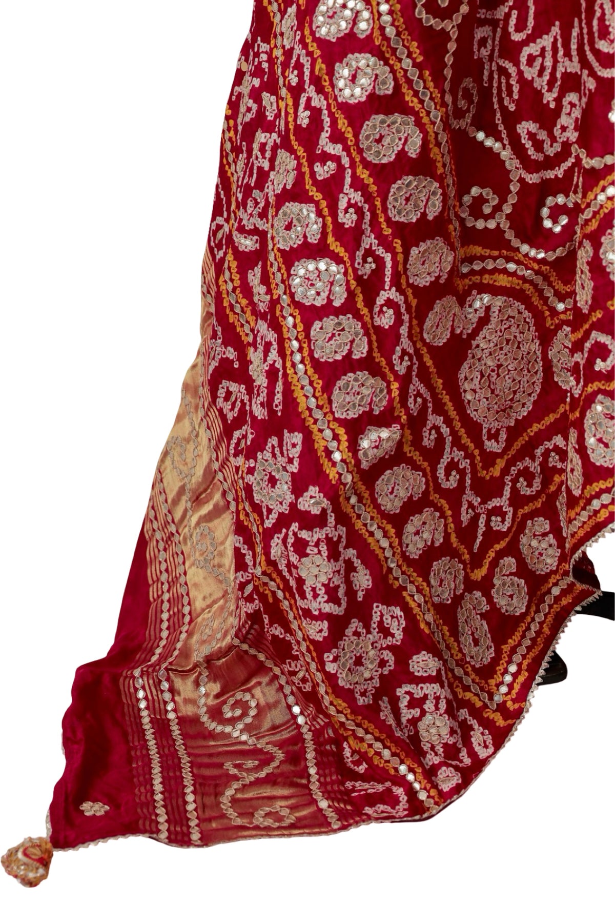Ornate border with repeating Gota Patti motifs and narrow yellow accents on red silk