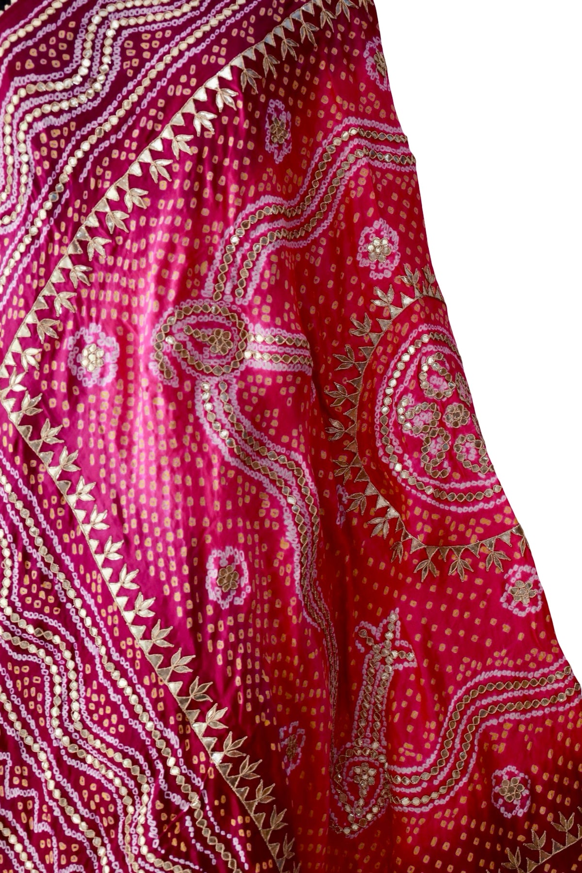 Flowing Gota Patti vines and circular floral motifs on pink silk with yellow Bandhani dots