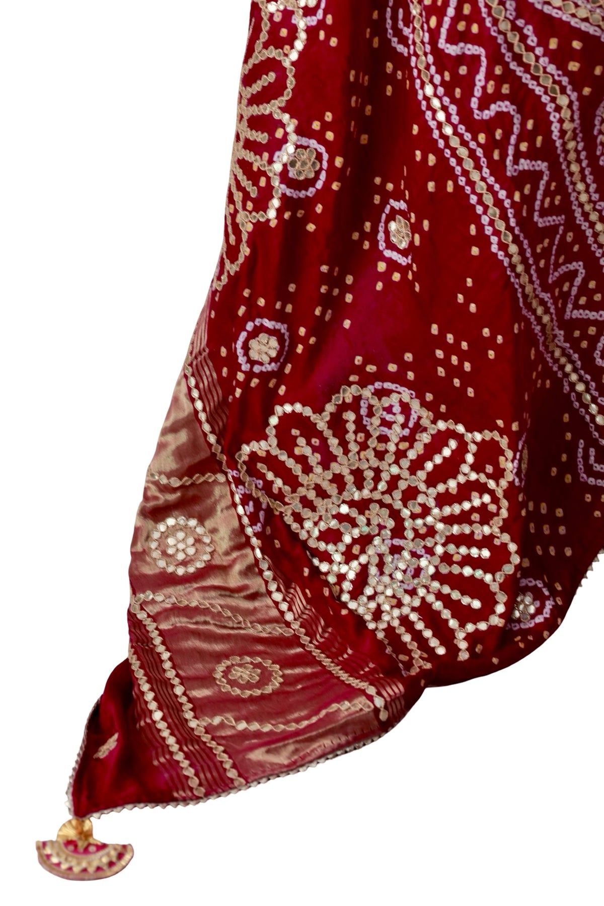 Gota Patti leaf edging and decorative motifs across pink and burgundy Gajji silk