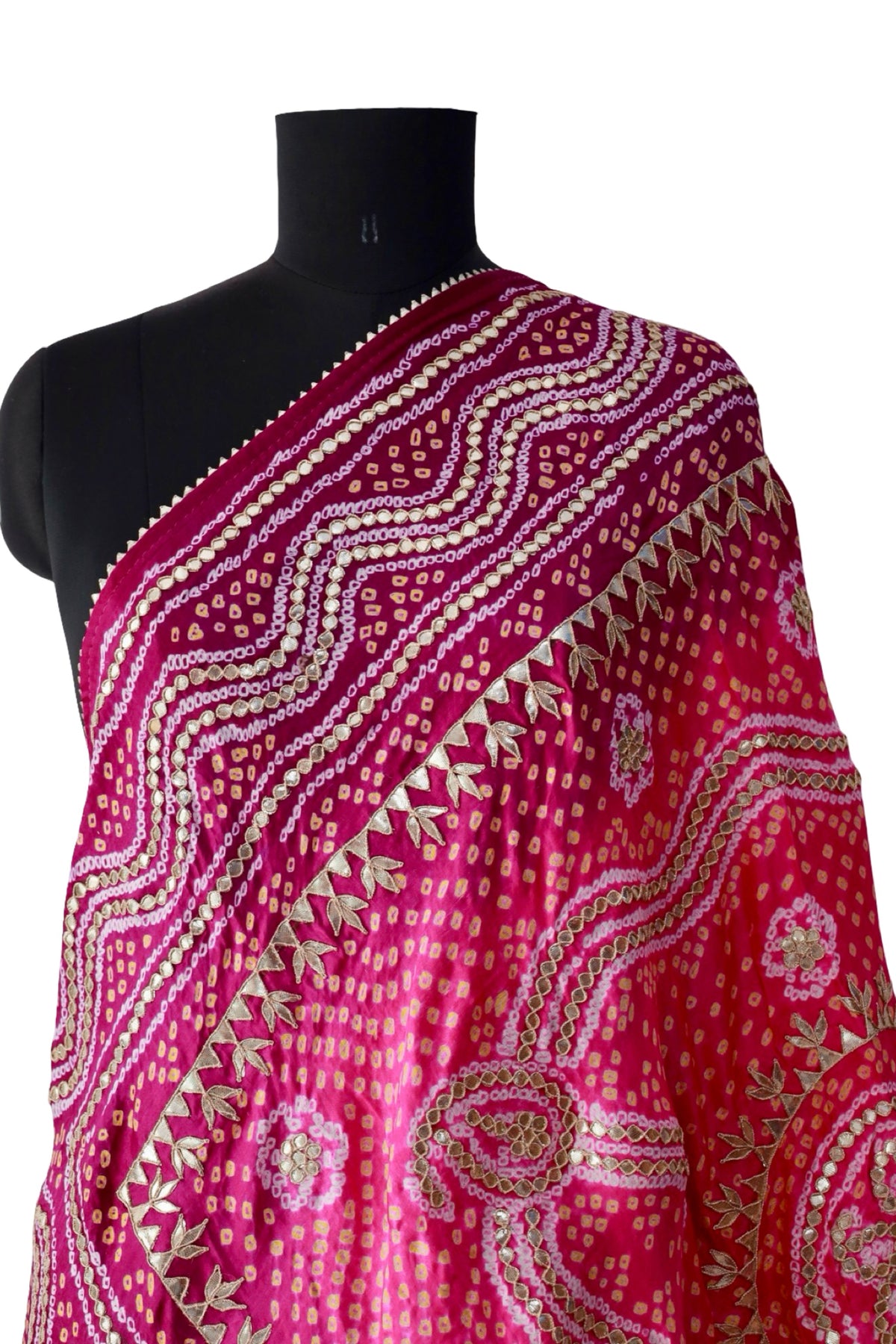 Bright pink Bandhani dupatta with a contrasting burgundy border