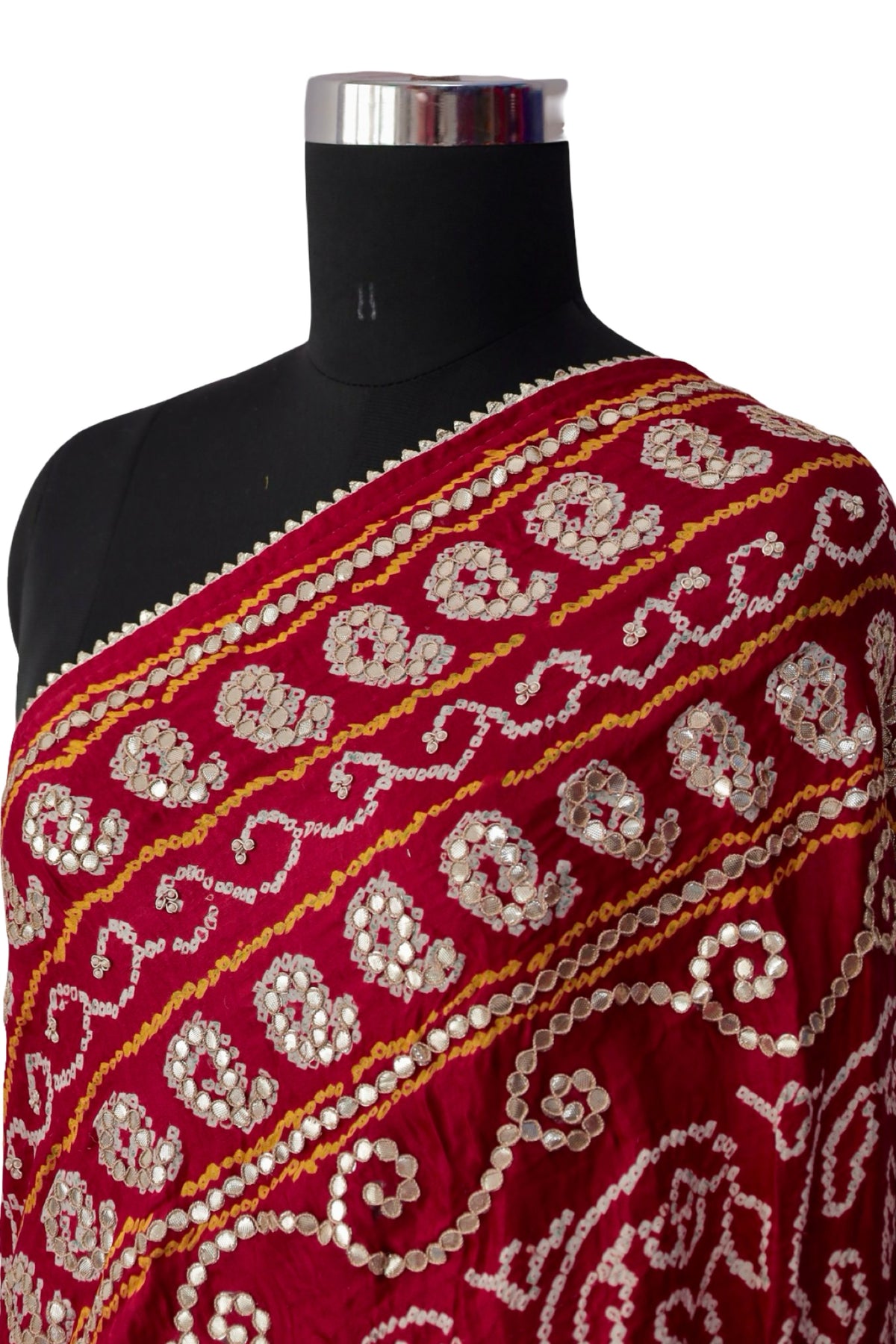 Metallic Gota Patti floral medallions across a crimson red Bandhani dupatta
